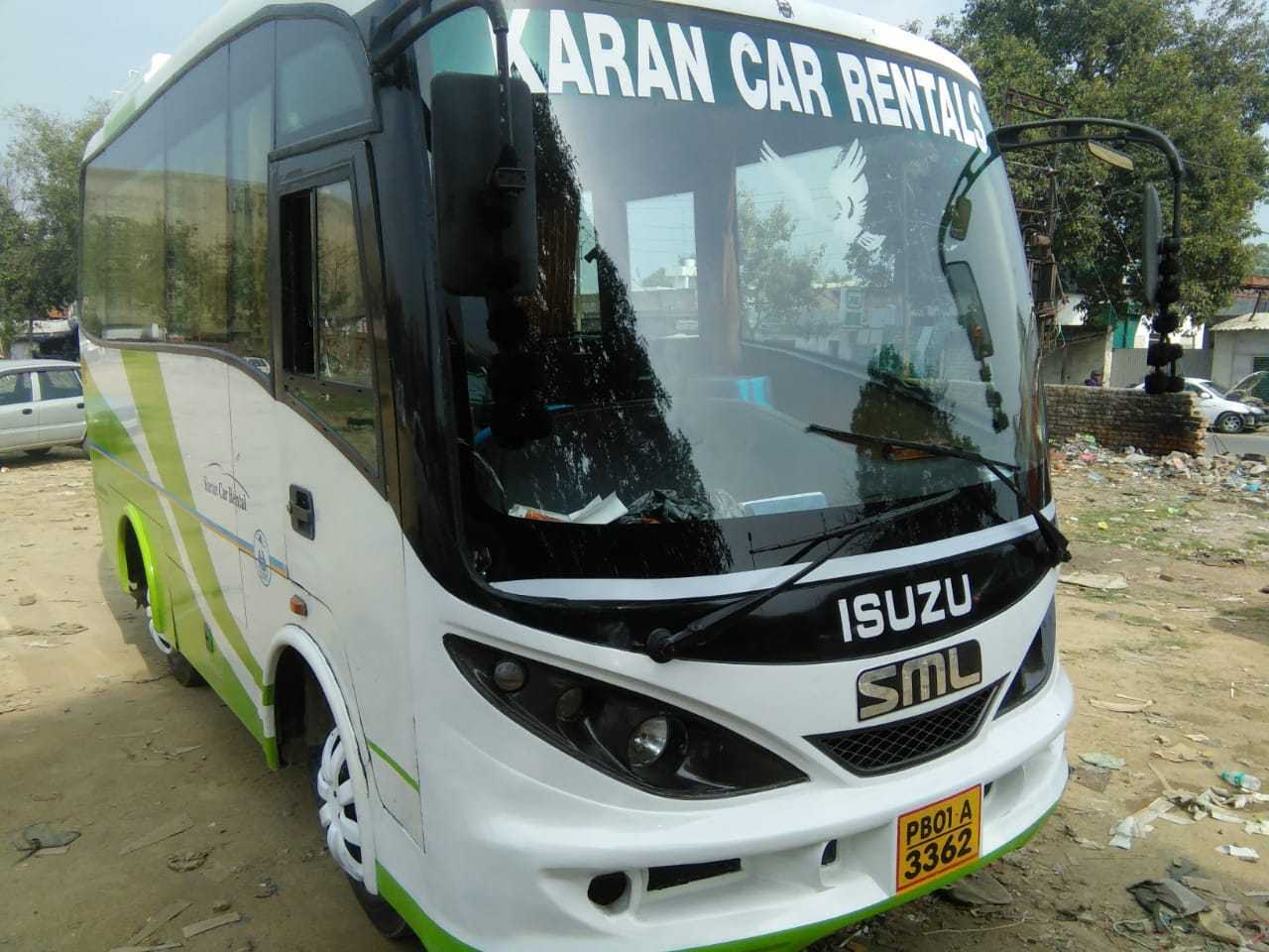 12 Seater SML Isuzu Mini Bus Rental in Amritsar,